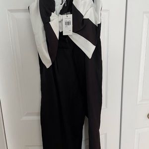 Black jumpsuit never worn. See original tag